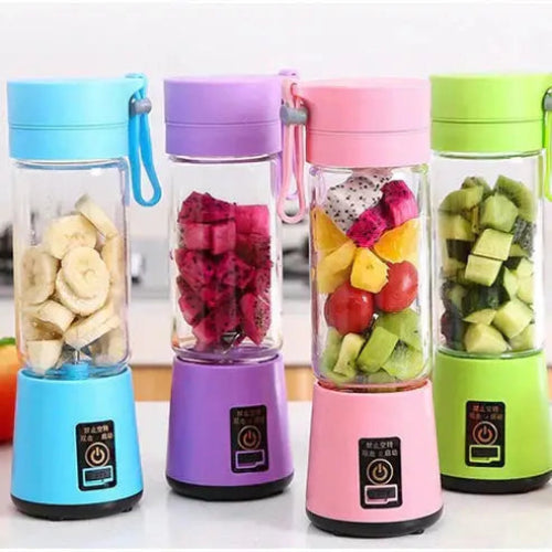 Multi color portable blenders side by side on table