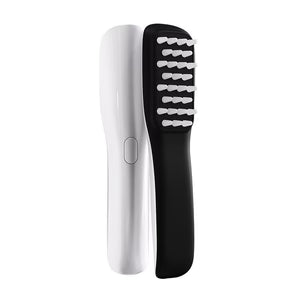 White and black hairbrush on a white background