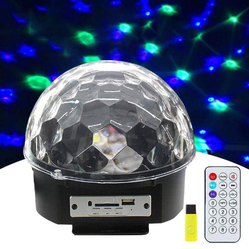 Crystal LED light ball illuminating party room with swirling colors