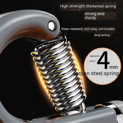 Close-up view of a metal spring grip trainer, designed to improve wrist and hand endurance.