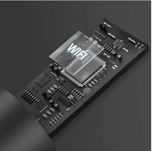 Close-up of internal WiFi-enabled HD camera chip from Smart Earwax Remover Kit, showcasing advanced circuit board design for precise ear cleaning.