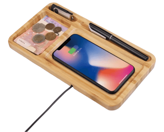 Bamboo Charger - Eco Wireless Charging tray with phone, coins, and pen organized; sleek bamboo wood design for fast Qi-enabled charging.