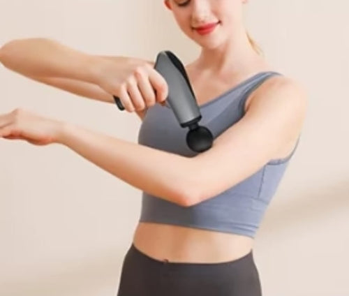 Massage gun with ergonomic grip and LED screen