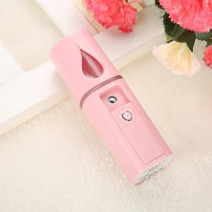 Pink colour mini facial device
