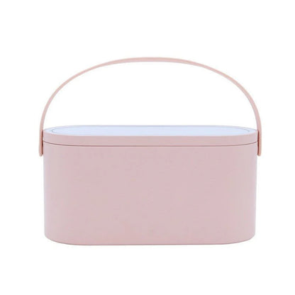 LED Makeup Mirror Box – Portable Storage Organizer in light pink with sleek oval design and top handle for easy travel and cosmetic storage.
