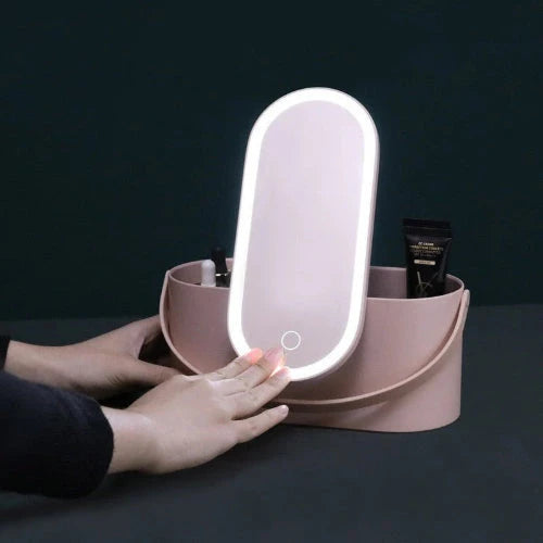 Compact LED makeup mirror with adjustable brightness and storage drawers 