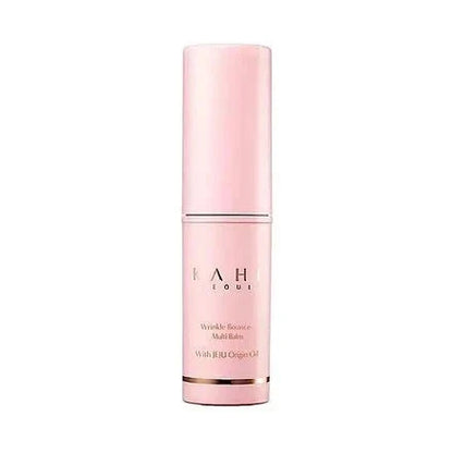 Pink skincare bottle with on a white background
